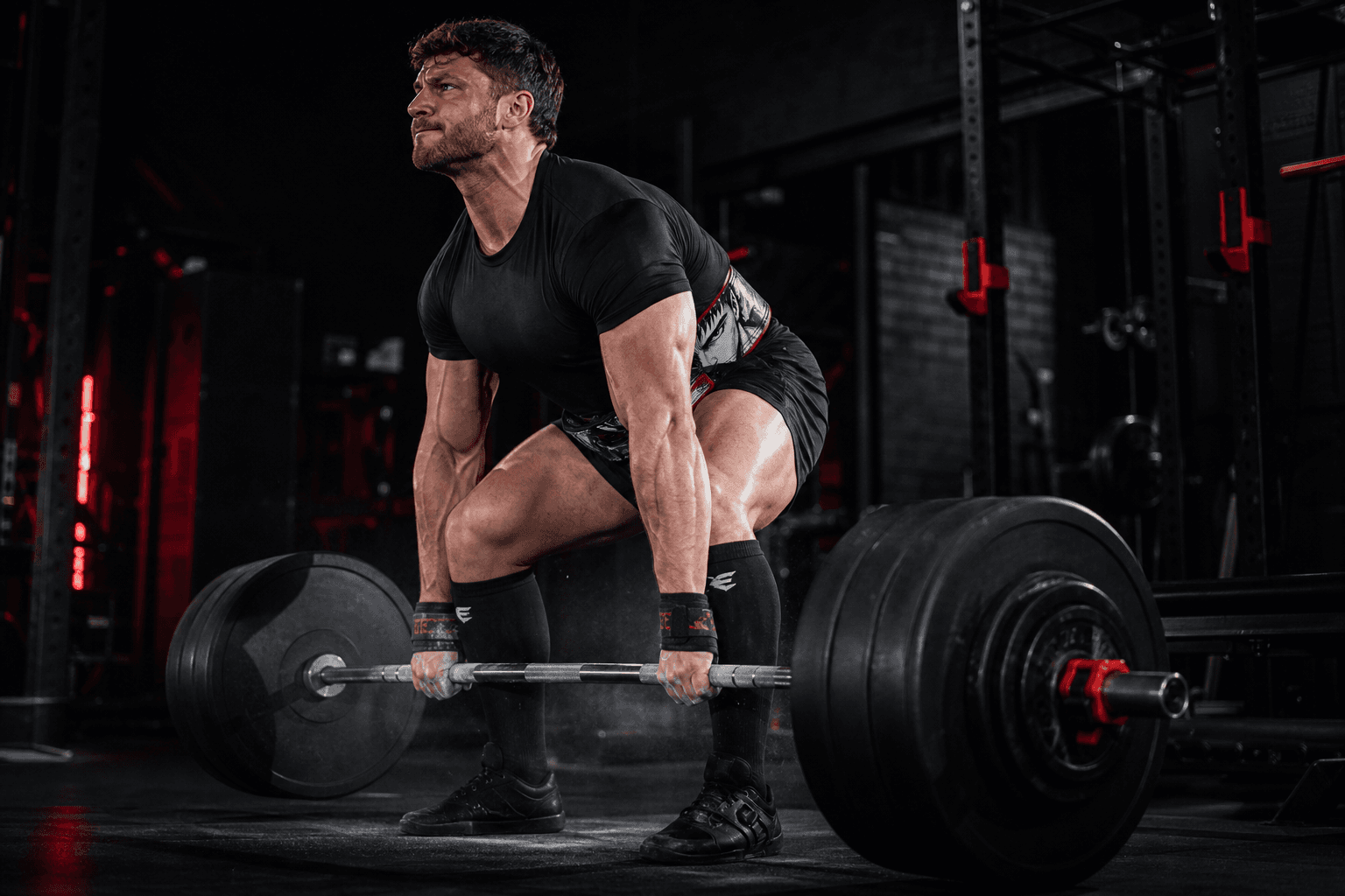 Athlete deadlifting while wearing the FORGE Berserk lever belt